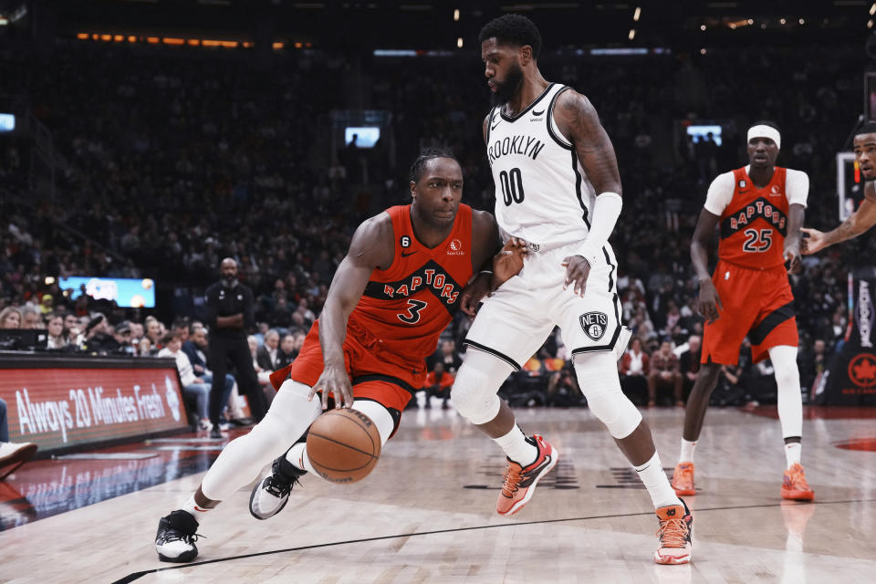 Toronto Raptors forward O.G. Anunoby (3) drives against Brooklyn Nets forward Royce O'Neale (00) during the first half of an NBA basketball game Wednesday, Nov. 23, 2022, in Toronto. (Chris Young/The Canadian Press via AP)