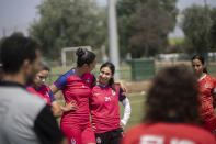 Women players of Fath Union Sport soccer team take part in a training session in Rabat, Morocco, Friday, May 19, 2023. (AP Photo/Mosa'ab Elshamy)