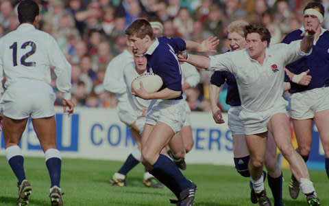 Scotland player Tony Stanger breaks away from England's Mike Teague during a rugby match, 17th March 1990. Scotland won 13-7 - Credit: Getty Images