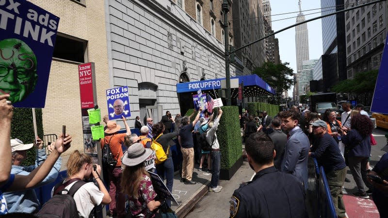 MoveOn activists protest at Fox Corp. Upfront with a message aimed at advertisers not to fund Fox News on May 15, 2023 in New York City. Advocacy group MoveOn is warning corporations that by advertising on Fox News they are enabling the spread of disinformation. 