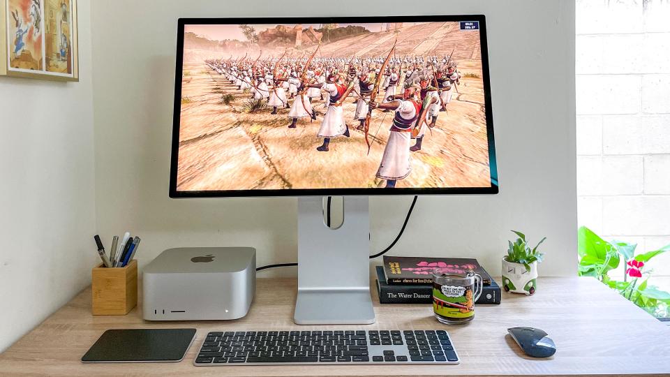 Mac Studio on desk showing Total War: Warhammer II running