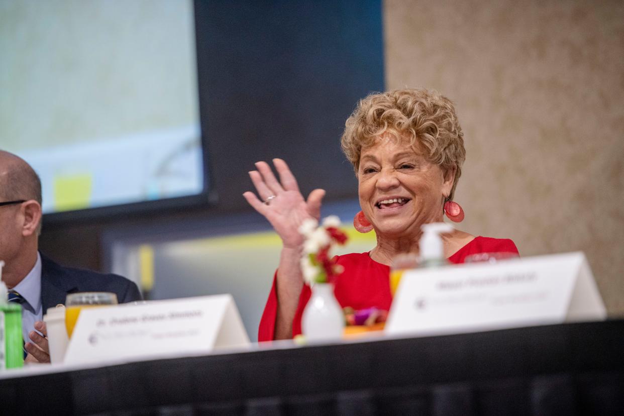 Oralene Simmons, MLK Association founder and president, waves to attendees of the 42nd annual Martin Luther King Jr. Prayer Breakfast at the Crowne Plaza in Asheville January 14, 2023.