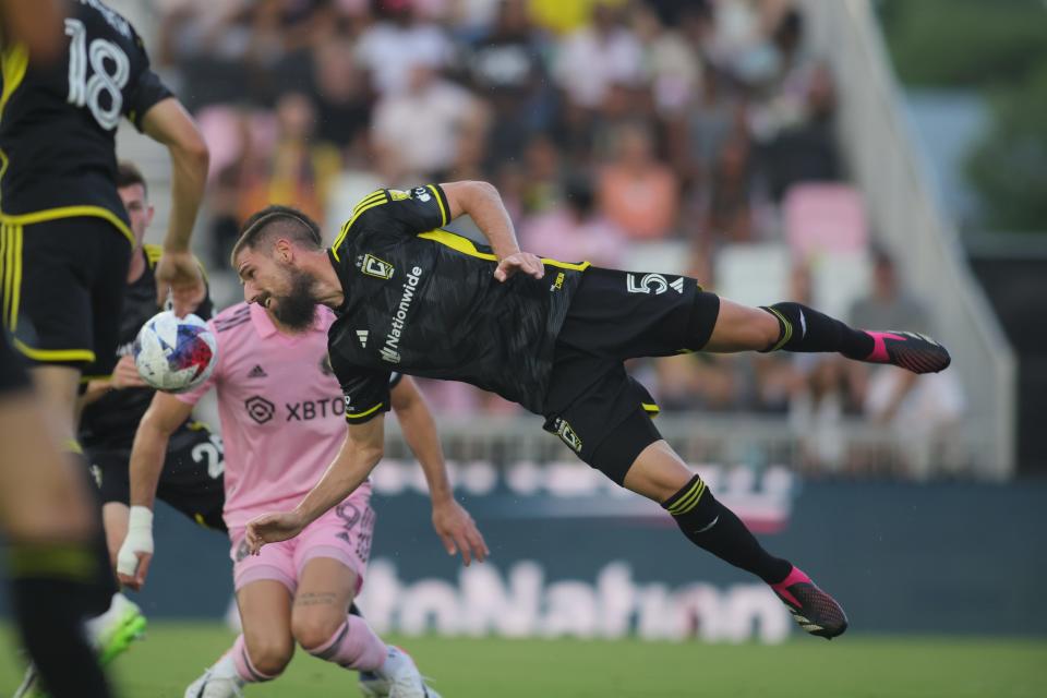 Jul 4, 2023; Fort Lauderdale, Florida, USA; Columbus Crew SC defender Milos Degenek (5) clears the ball with a header during the first half against the Inter Miami at DRV PNK Stadium. Mandatory Credit: Sam Navarro-USA TODAY Sports