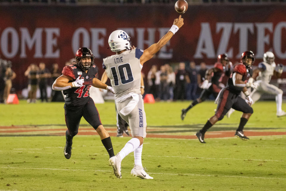 Utah State QB Jordan Love is off to a slow start but still could find his way into Round 1. (Getty Images)