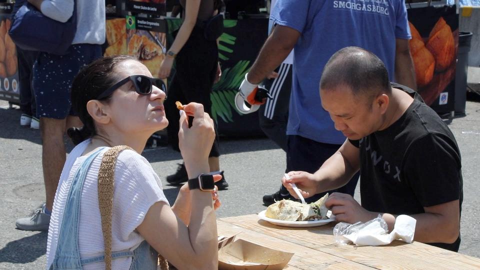 Vendors serve unique culinary dishes at Smorgasburg in Jersey City on Saturday morning May 28, 2022.