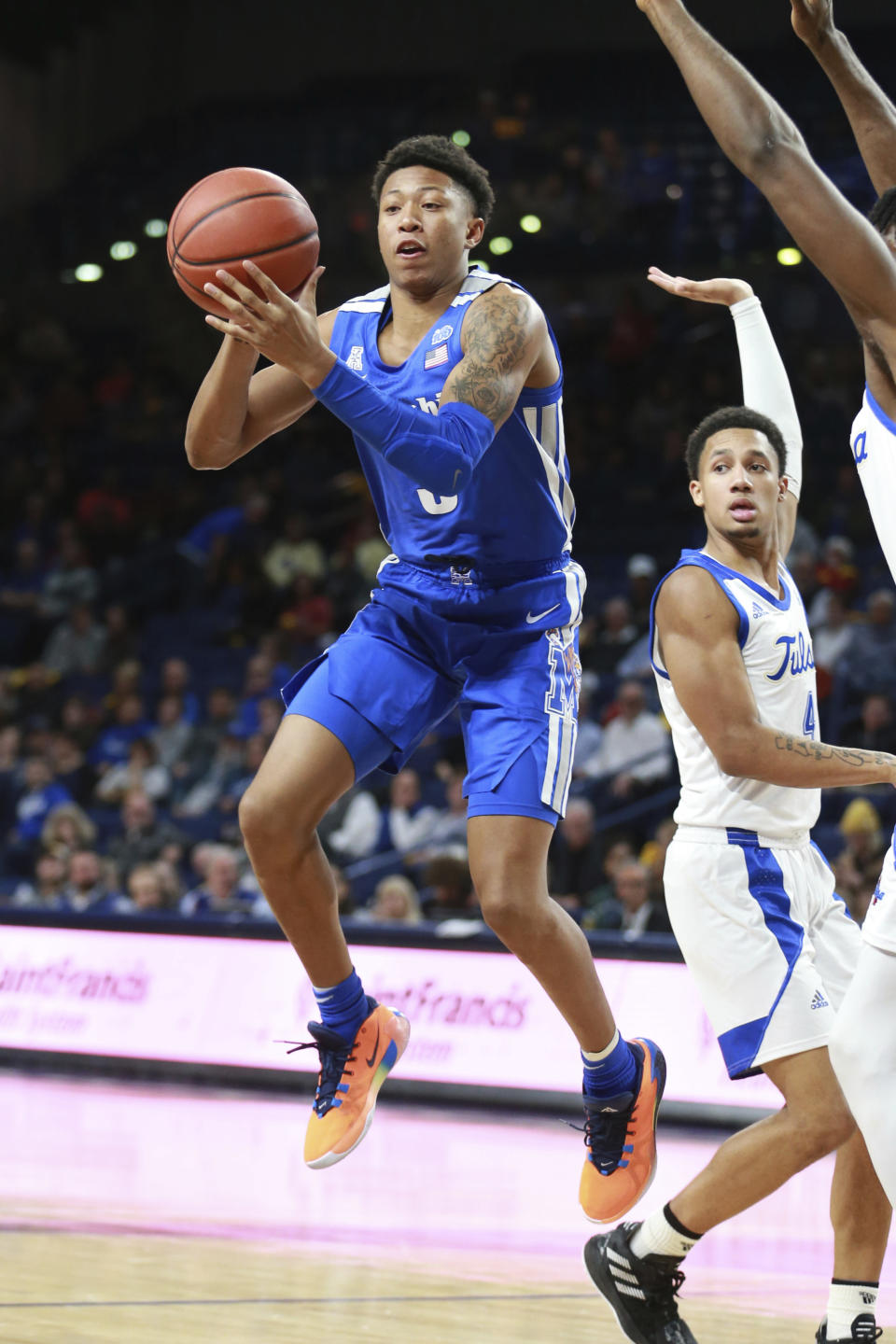 Memphis guard Boogie Ellis (5) passes in the first half of an NCAA college basketball game against Tulsa in Tulsa, Okla., Wednesday, Jan. 22, 2020. (AP Photo/Joey Johnson)