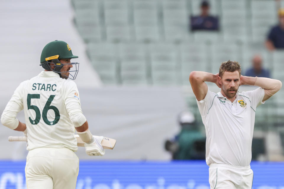 South Africa's Enrich Nortje, right, reacts after bowling to Australia's Mitchell Starc, left, during the second cricket test between South Africa and Australia at the Melbourne Cricket Ground, Australia, Wednesday, Dec. 28, 2022. (AP Photo/Asanka Brendon Ratnayake)