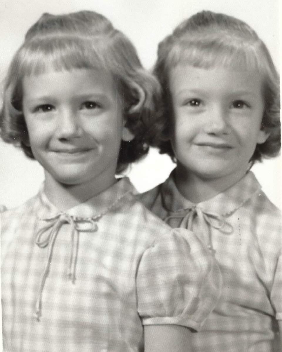 Twin sisters Carla (left) and Charla Haley, both 5, pose for a photo in 1961 in Ashland, Kansas. At age 58, Carla died in 2015 after a battle with lung cancer. Eight years later, Charla Haley continues to grieve the loss of her twin. | Haley family photo