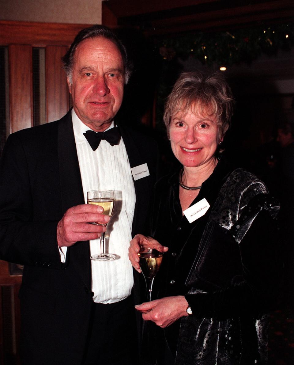 <p>Geoffrey Palmer with his wife Sally in 1993</p>PA