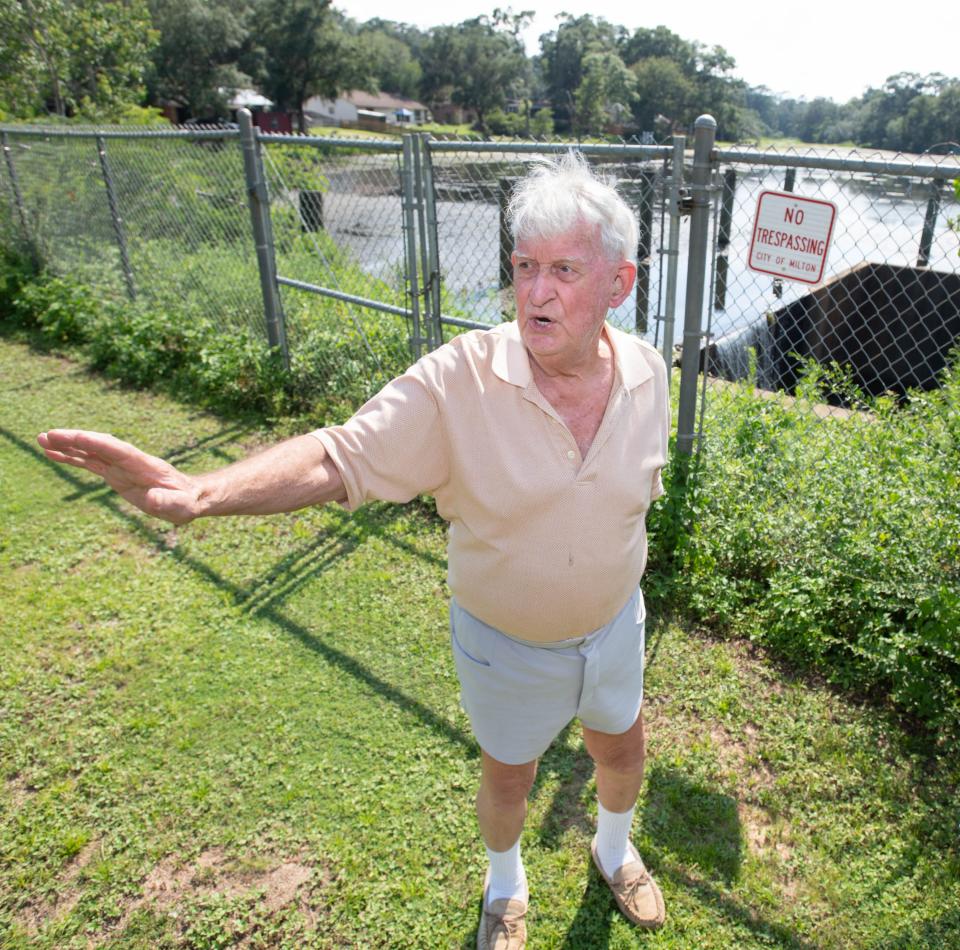 Burt Locklin gives a tour of the dam at Locklin Lake in Milton on Monday, July 24, 2023.