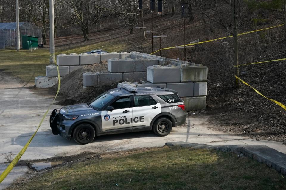 The scene where two police officers were injured while chasing a shooting suspect is pictured in Toronto, Tuesday, March 12, 2024.