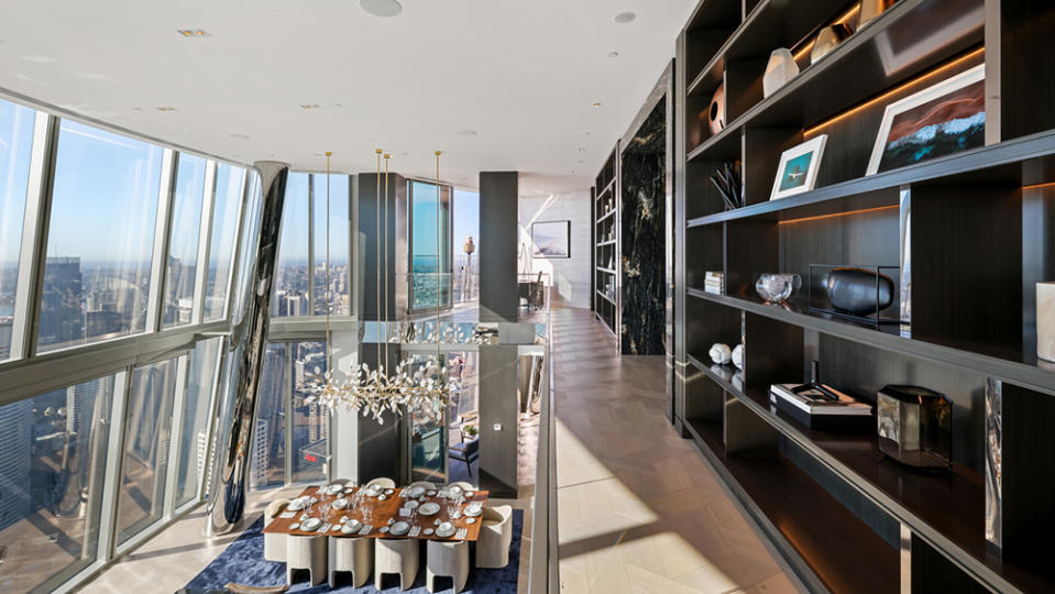 A second floor hallway overlooking the dining area. - Credit: Photo: Tate Martin