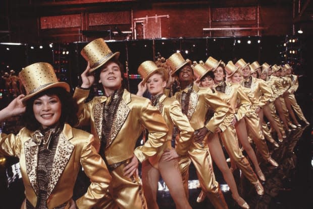 The cast of the film 'A Chorus Line' on stage at the Mark Hellinger Theatre on Broadway in New York City in <a href="https://parade.com/living/january-holidays-observances" rel="nofollow noopener" target="_blank" data-ylk="slk:January;elm:context_link;itc:0;sec:content-canvas" class="link ">January</a> 1985.<p>Jack Mitchell/Getty Images</p>