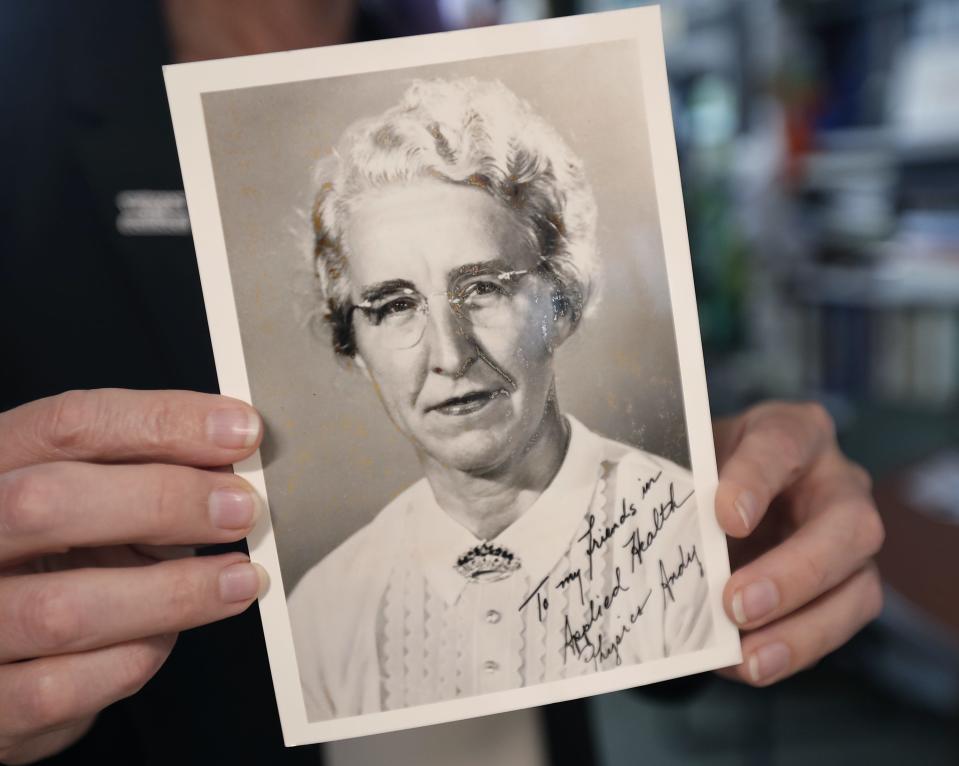 Megan Pickett holds a photo of Elda Anderson. Pickett is a Lawrence physics professor, who is working on research about Elda Anderson with plans to eventually write a book about her life, including how Anderson was recruited while a Downer professor to join the war effort, leading her to work on the Manhattan Project.
Thursday, July 27, 2023 at Lawrence University in Appleton, Wis. 
Wm. Glasheen USA TODAY NETWORK-Wisconsin