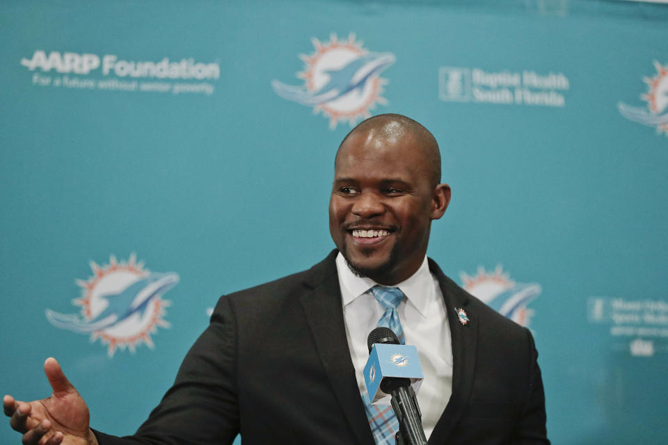 The new Miami Dolphins head coach Brian Flores speaks during a news conference on Monday, Feb. 4, 2019, in Davie, Fla. Hours after his team won the Super Bowl, New England Patriots linebackers coach Flores has been hired as head coach of the Miami Dolphins. (AP Photo/Brynn Anderson)