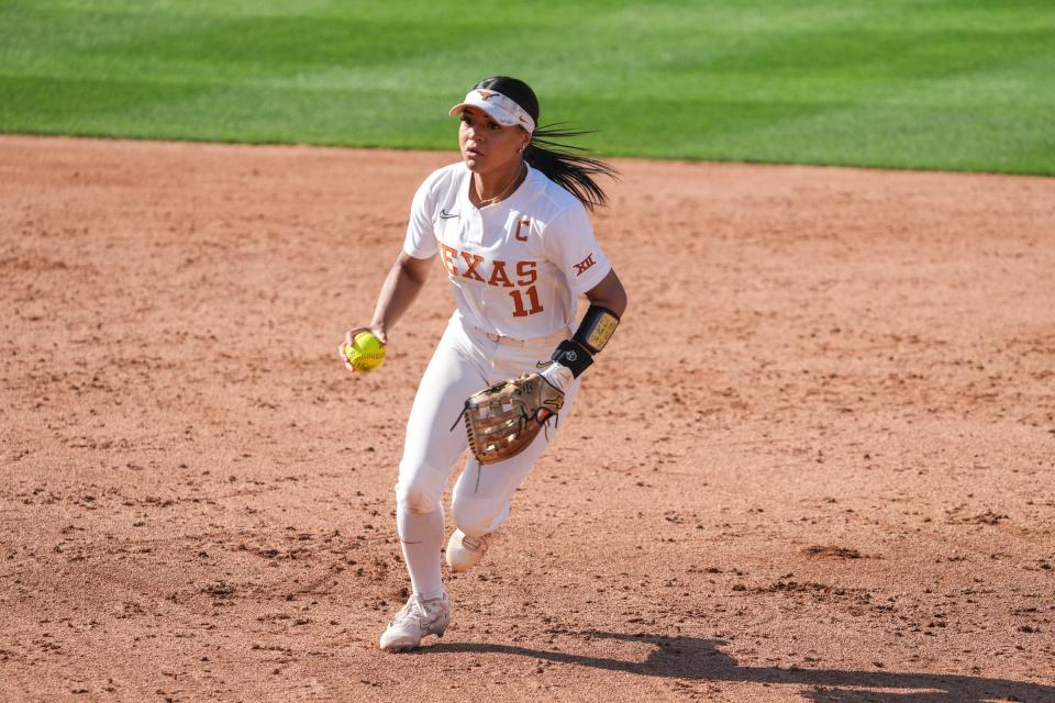 Second baseman Alyssa Washington had one of four home runs for the Longhorns as they beat Northwestern 14-2 Saturday at McCombs Field. Texas needs one more win to secure a spot in next week's NCAA super regionals.