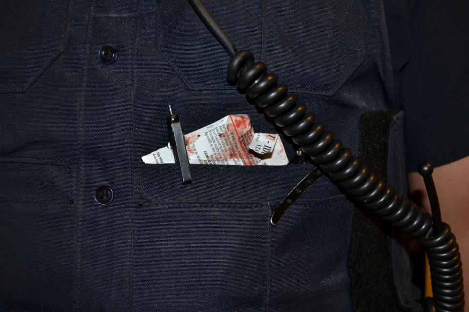 The bloodied car insurance papers of Philando Castile are seen in the pocket of St. Anthony Police Department officer Jeronimo Yanez.&nbsp;