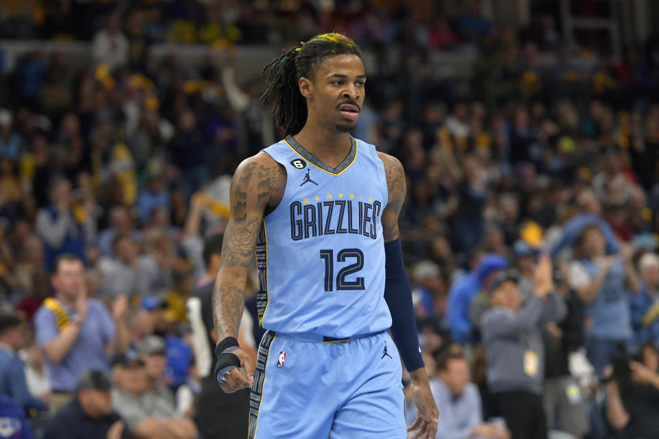 FILE - Memphis Grizzlies guard Ja Morant (12) plays during the second half of Game 5 in a first-round NBA basketball playoff series against the Los Angeles Lakers, Wednesday, April 26, 2023, in Memphis, Tenn. Morant has been suspended for the first 25 games of the upcoming season for his second known incident of displaying what appeared to be a firearm on social media, the NBA announced Friday, June 16, 2023. (AP Photo/Brandon Dill, File)