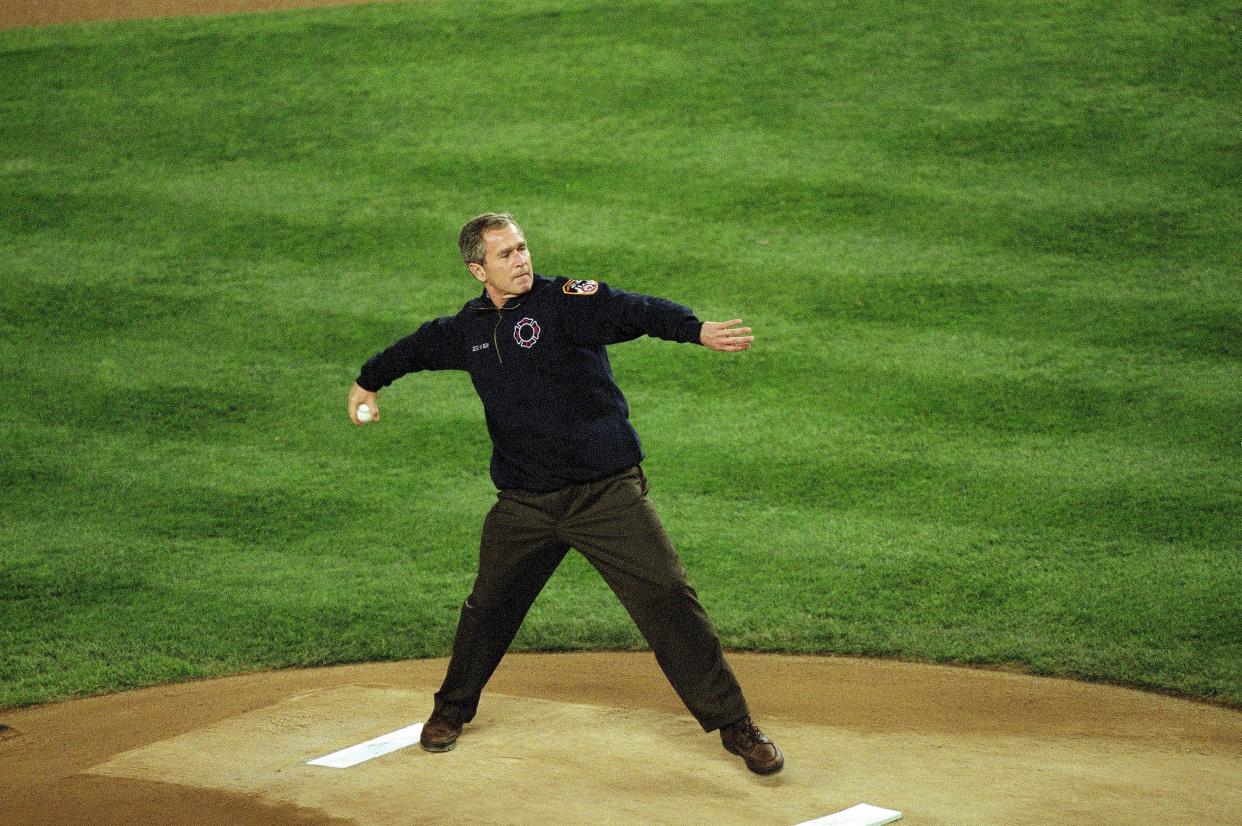 The former U.S. president threw out the ceremonial first pitch before Game 3 of the 2001 World Series at Yankee Stadium, which also featured the Diamondbacks. (Photo by Chuck Solomon/Sports Illustrated via Getty Images)