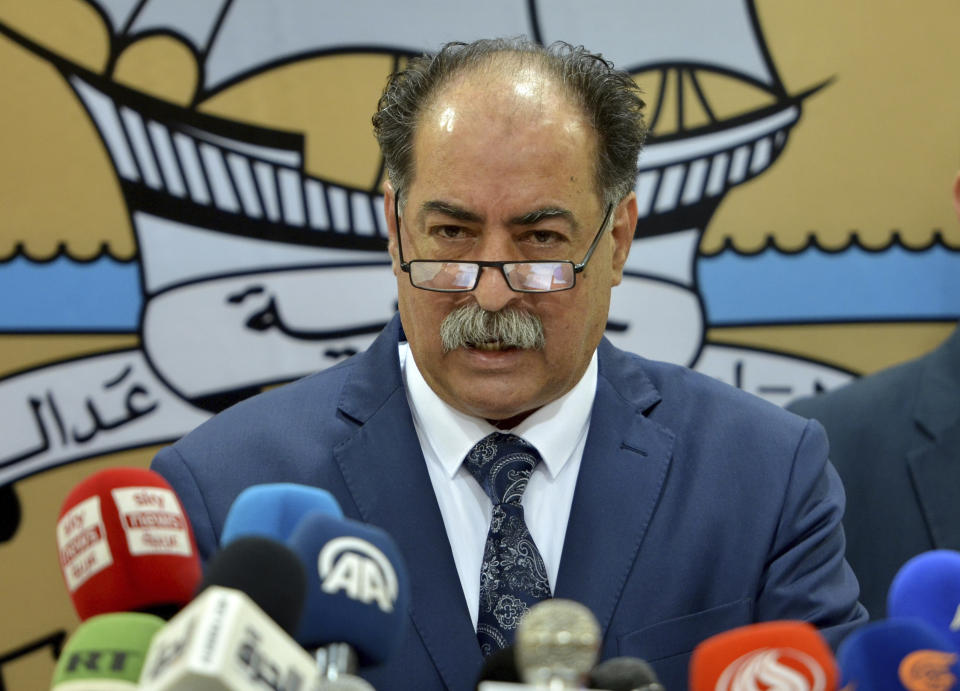 Tunisian Interior Minister Kamel Feki speaks during a press conference in Tunis, Thursday, May 11, 2023. Tunisian authorities have opened an investigation into a shooting attack at a synagogue that killed two Jewish pilgrims and three members of the country's security forces. (AP Photo/Hassene Dridi)