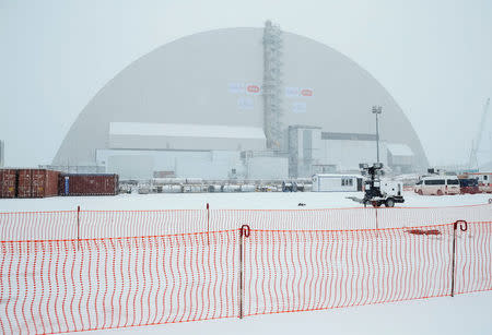 A general view shows a New Safe Confinement (NSC) structure over the old sarcophagus covering the damaged fourth reactor at the Chernobyl nuclear power plant, in Chernobyl, Ukraine November 29, 2016. REUTERS/Gleb Garanich