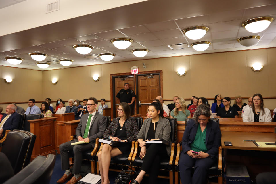 People await the start of a hearing over West Virginia's 1800s-era abortion ban in Kanawha County Circuit Court in Charleston, W.Va., on Monday, July 18, 2022. (AP Photo/Leah Willingham)