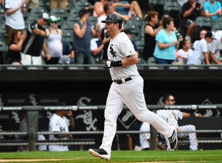 Adam Dunn traded to Athletics for minor league pitcher 