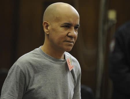 Pedro Hernandez appears with his lawyer Harvey Fishbein (unseen) in the Manhattan Criminal Court in New York November 15, 2012. REUTERS/Louis Lanzano/Pool