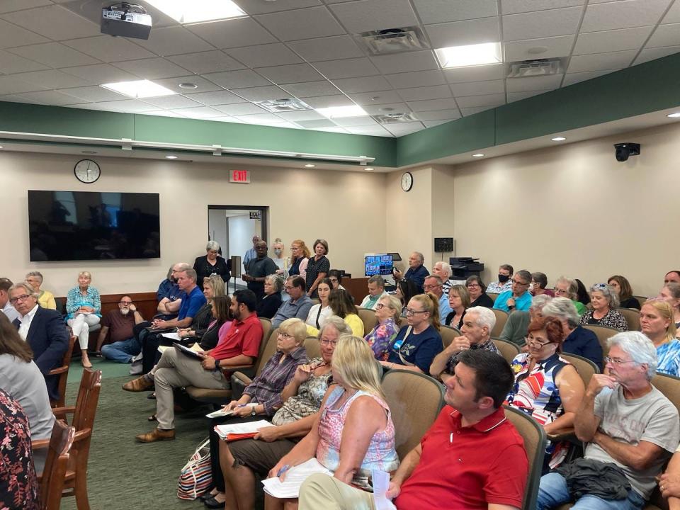 A crowd of people attend the Aug. 29 regular meeting of Erie County Council. Many of them attended to voice their opposition to a proposed business park in Fairview Township.
