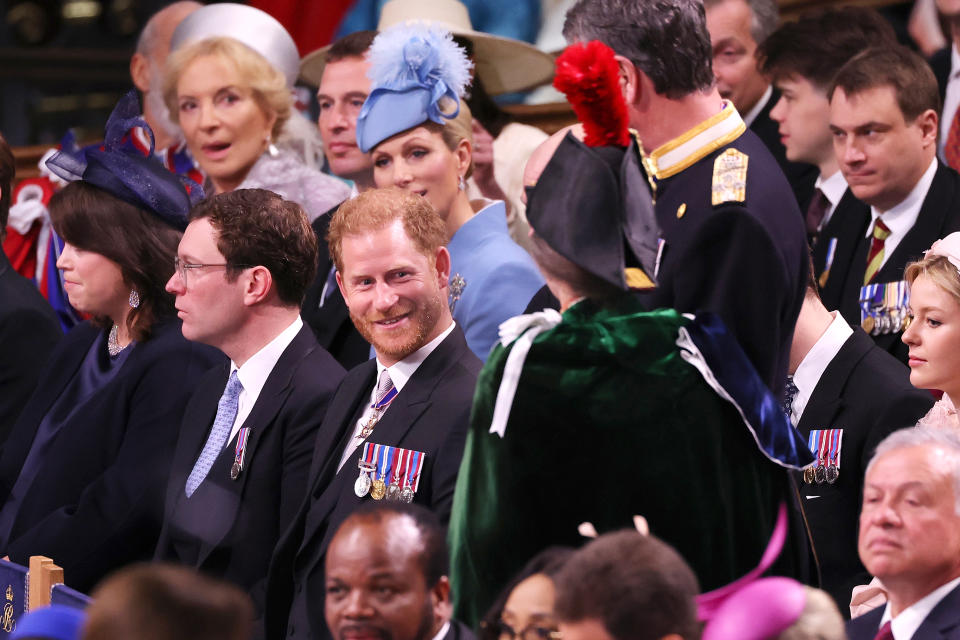 LONDON, ENGLAND - MAY 06: Prince Harry, Duke of Sussex speaks to Princess Anne, Princess Royal during the Coronation of King Charles III and Queen Camilla at Westminster Abbey on May 6, 2023 in London, England. The Coronation of Charles III and his wife, Camilla, as King and Queen of the United Kingdom of Great Britain and Northern Ireland, and the other Commonwealth realms takes place at Westminster Abbey today. Charles acceded to the throne on 8 September 2022, upon the death of his mother, Elizabeth II. (Photo by Richard Pohle  - WPA Pool/Getty Images)