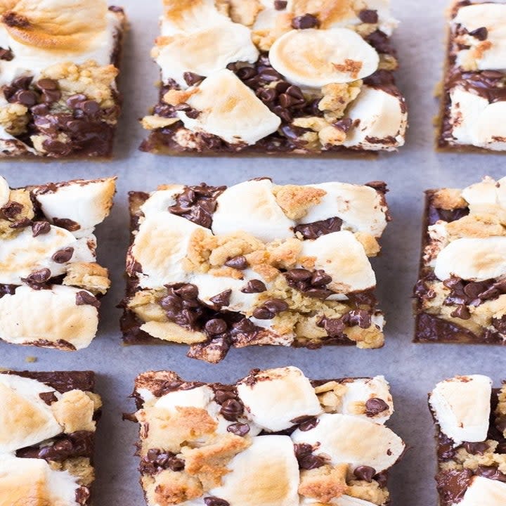 cookie bars with chocolate chips and marshmallows on top of them