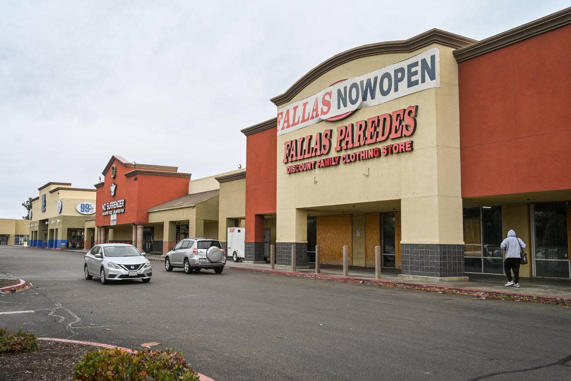 Although the sign says “now open,” Fallas Paredes in the Kings Canyon Pavilion shopping center is actually closed and empty on Tuesday, Feb. 28, 2023.