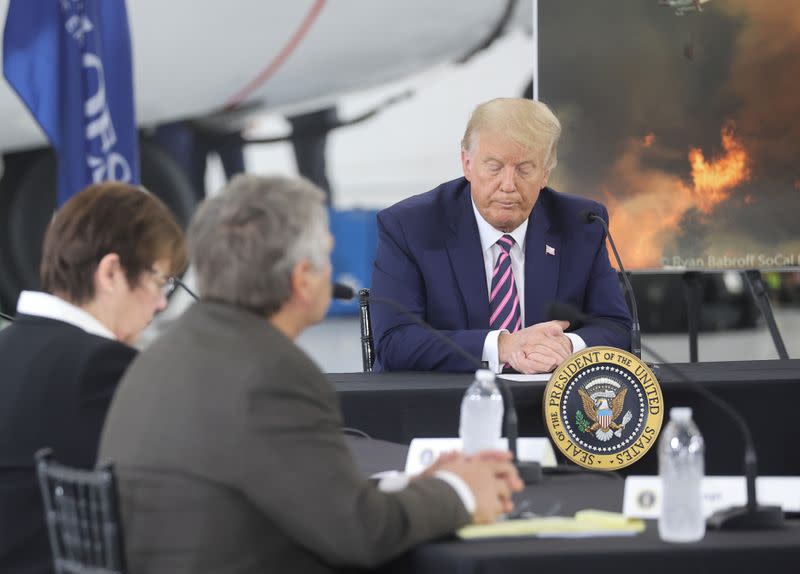 U.S. President Trump participates in a briefing on wildfires in McClellan Park in McClellan Park, California