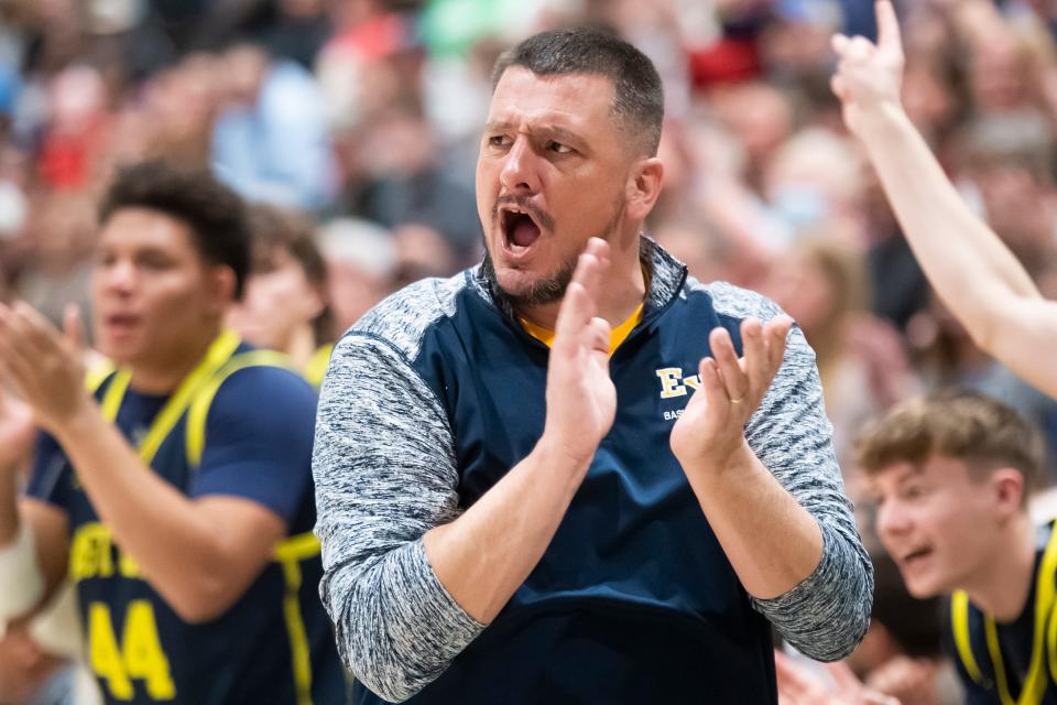 Eastern York head coach Justin Seitz claps as the Golden Knights take on Central York in a YAIAA boys' semifinal game at York Tech, Tuesday, Feb. 14, 2023, in York Township. The Panthers won, 72-59.