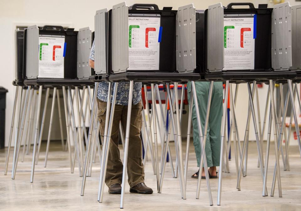 People cast their vote at the voting center for Bloomington precincts 3, 7, and 22 as well as Perry precincts 6, 8, 15 and 31 on Tuesday, May 3, 2022.