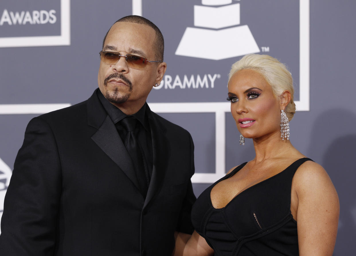 Ice-T and his wife Coco arrive at the 54th annual Grammy Awards in Los Angeles, California February 12, 2012.  REUTERS/Danny Moloshok   (UNITED STATES) (GRAMMYS-ARRIVALS)