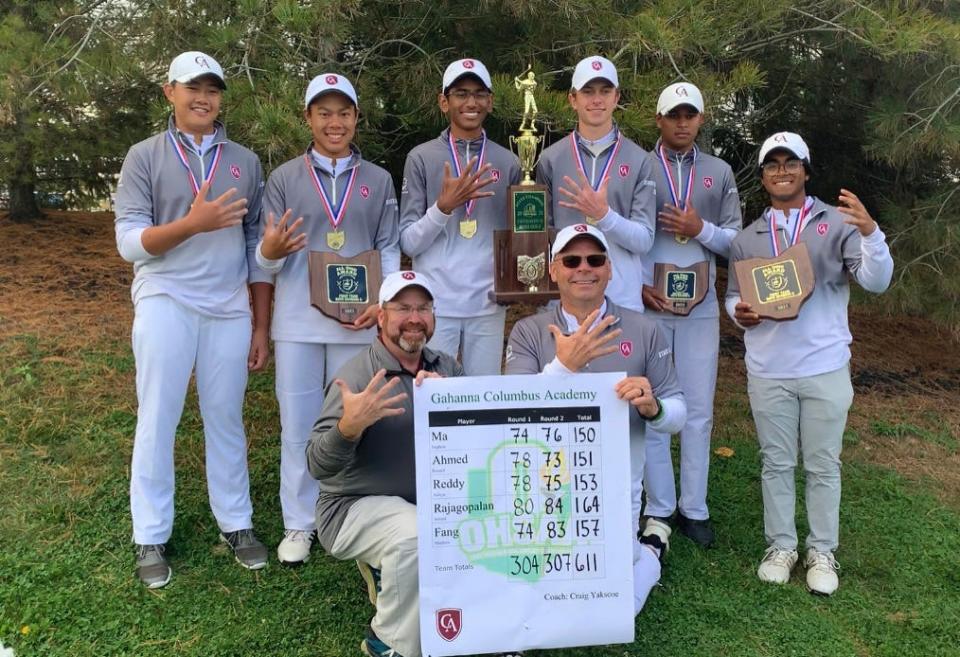 The Columbus Academy boys golf team displays its championship trophy after winning its fifth consecutive Division II state title Oct. 16 at NorthStar. In front are assistant coach Mike Stegemiller (left) and head coach Craig Yakscoe. In back are Matthew Fang (left), Stephen Ma, Arvind Rajagopalan, Jake Stouffer, Aditya Reddy and Russell Ahmed.