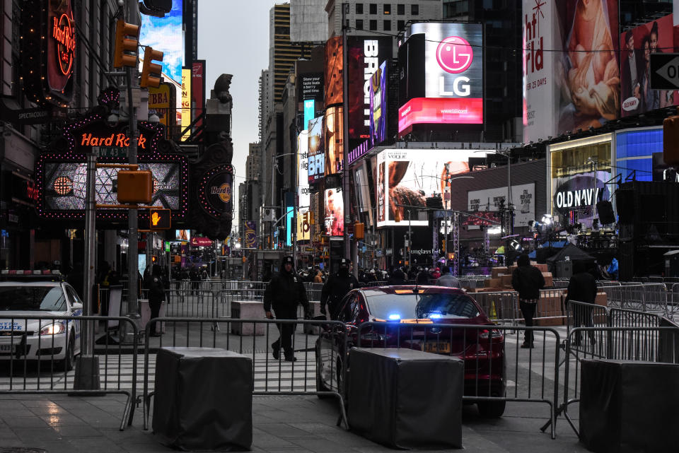 <p>Members of the New York City police department patrol in Times Square ahead of the New Year’s Eve celebration on December 31, 2017 in New York City. (Photo: Stephanie Keith/Getty Images) </p>