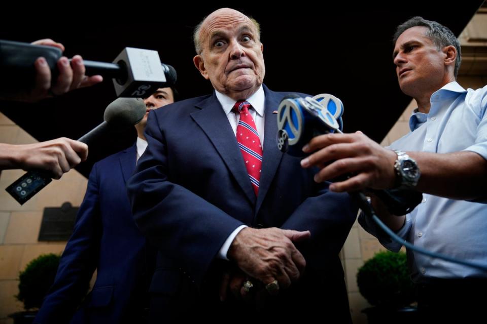 Former Mayor of New York Rudy Giuliani speaks to reporters as he leaves his apartment building in New York in August (Copyright 2023 The Associated Press. All rights reserved.)