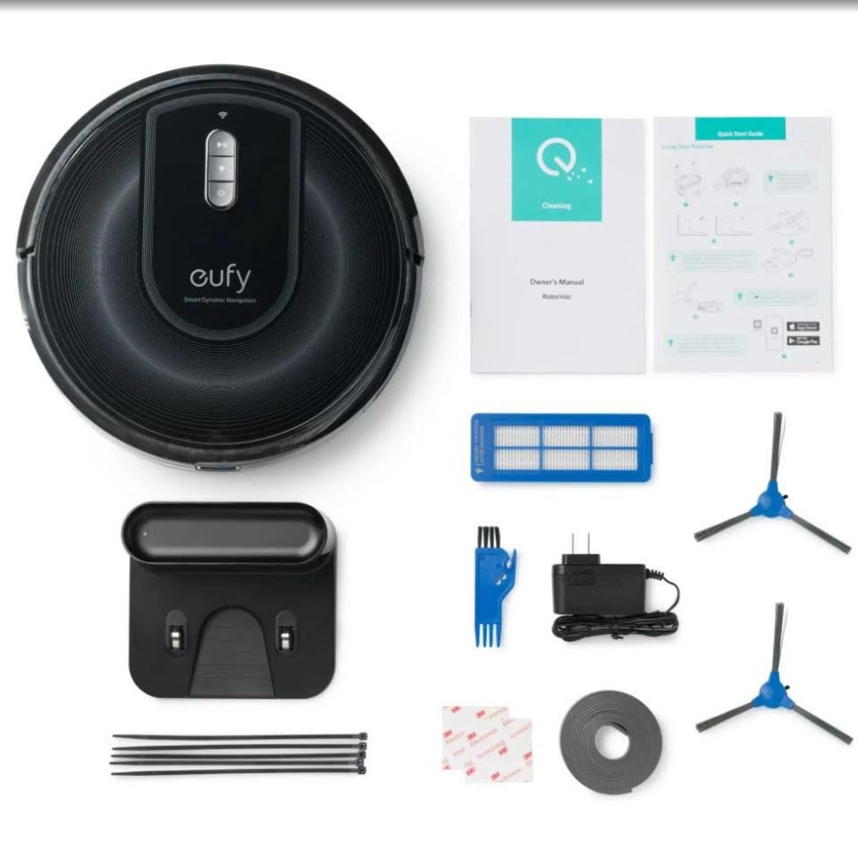 eufy brand floor vacuum and various pieces and manual