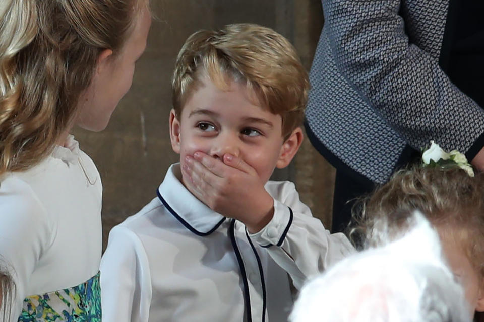 Prince George laughing at Princess Eugenie’s wedding. (Photo: Yui Mok/AFP/Getty Images)