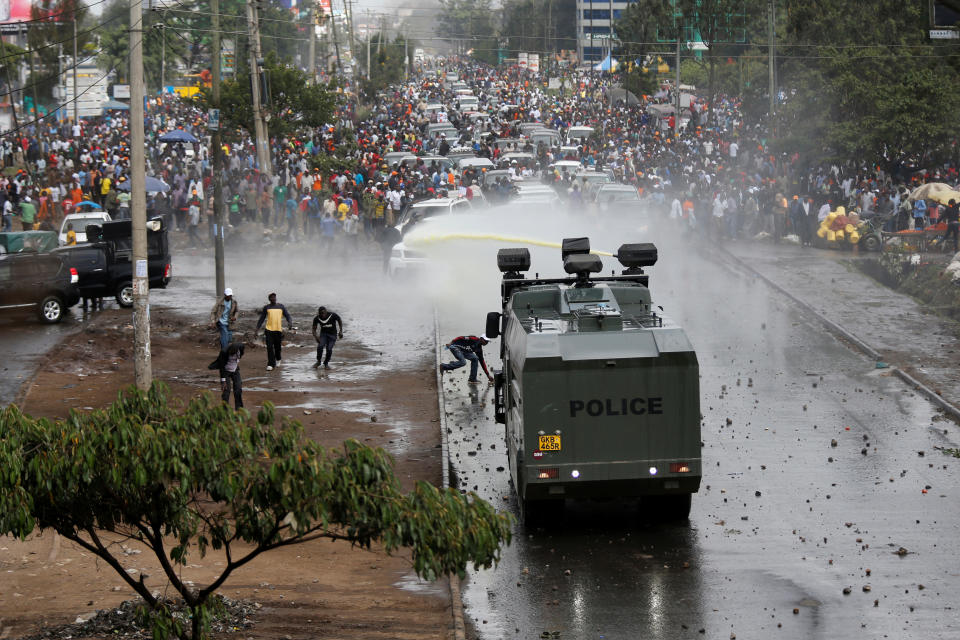 <p>Policemen spray water to disperse supporters of Kenyan opposition leader Raila Odinga in Nairobi, Kenya, Nov. 17, 2017. (Photo: Thomas Mukoya/Reuters) </p>