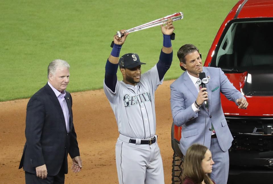 <p>Robinson Cano #22 of the Seattle Mariners and the American League celebrates with the Major League Baseball All-Star Game Most Valuable Player Award after they defeated the National League 2 to 1 during the 88th MLB All-Star Game at Marlins Park on July 11, 2017 in Miami, Florida. (Photo by Rob Carr/Getty Images) </p>