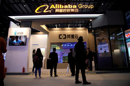 FILE PHOTO: A sign of Alibaba Group is seen during the fourth World Internet Conference in Wuzhen, Zhejiang province, China, December 3, 2017. REUTERS/Aly Song/File Photo