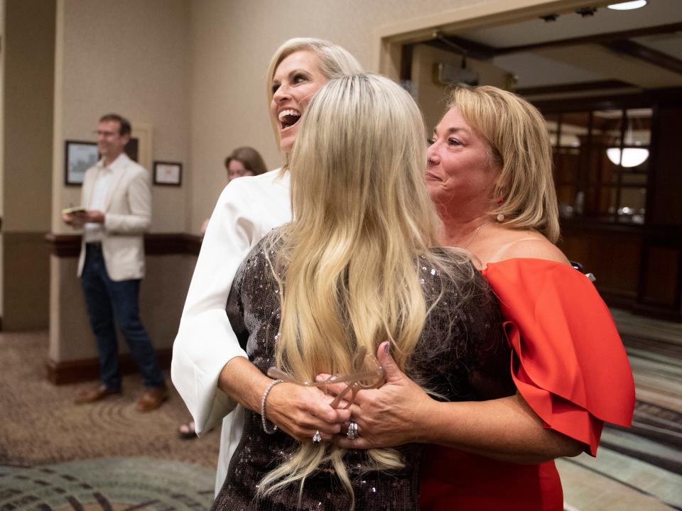From left, Kim Frazier, Rhonda Lee, and Gina Oster celebrate at the GOP election party after all three won seats on the Knox County Commission GOP in Knoxville, Tenn on Thursday, August 4, 2022. 