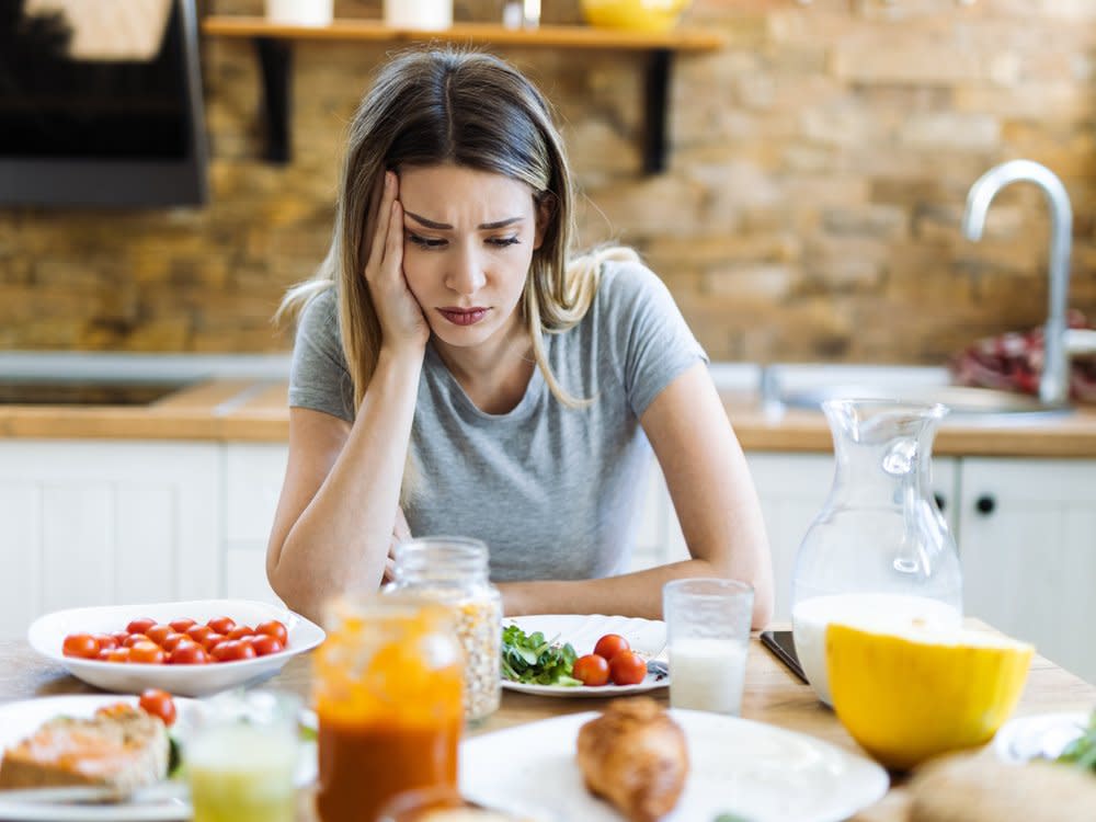 Kann Essen uns glücklicher machen? (Bild: Goksi/Shutterstock.com)