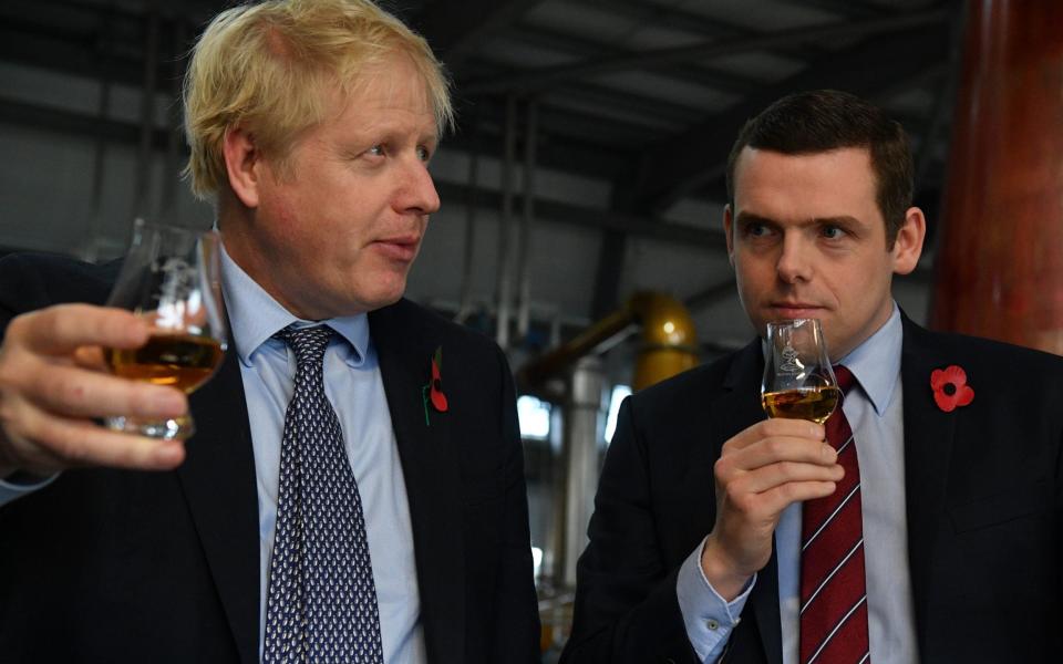 Boris Johnson with Douglas Ross, the Moray MP - Getty Images Europe