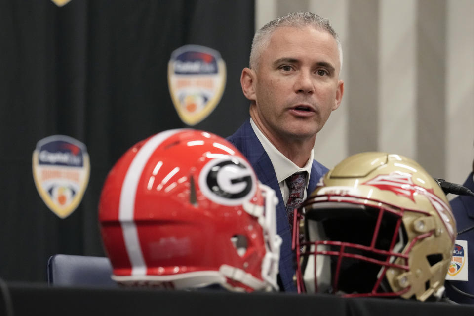 Florida State head coach Mike Norvell answers questions during a press conference one day ahead of the Orange Bowl NCAA college football game, in Dania Beach, Friday, Dec. 29, 2023. Georgia and Florida State will play in the Orange Bowl Saturday at Hard Rock Stadium in Miami Gardens. (AP Photo/Rebecca Blackwell)