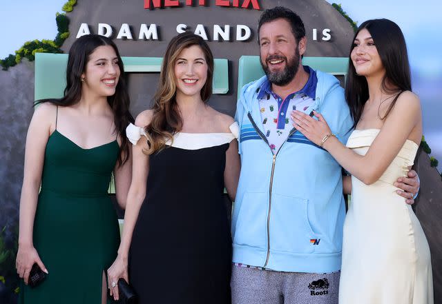 <p> Amy Sussman/Getty</p> Adam Sandler and wife Jackie with their daughters Sadie and Sunny.