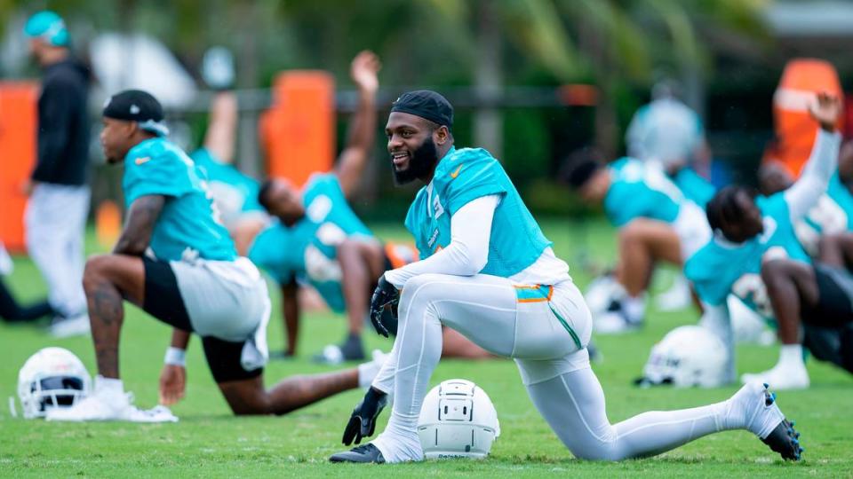 Miami Dolphins cornerback Noah Igbinoghene (9) stretches during team practice at the Baptist Health Training Complex on Wednesday, Oct. 19, 2022, in Miami Gardens, Fla.